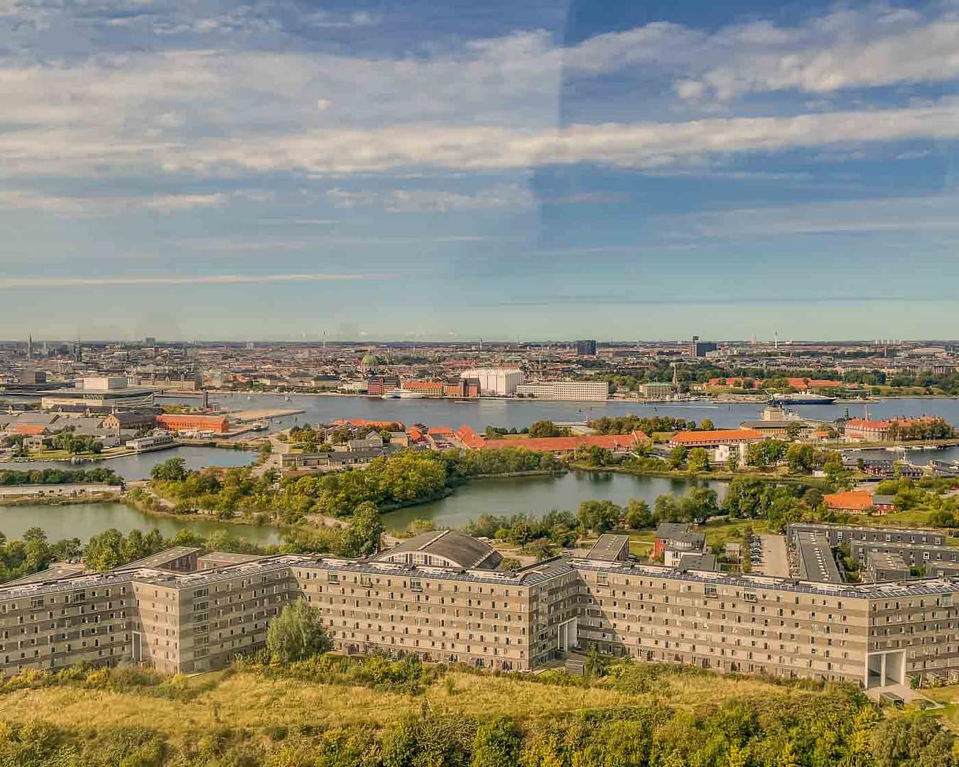 When people think about Copenhagen, images of colorful buildings, charming canals, and the iconic Little Mermaid statue come to mind. But what if I told you you could also go skiing in this vibrant city? No, you don't need to travel to the snowy mountains. Instead, head to Copenhill, an architectural marvel redefining urban recreation.