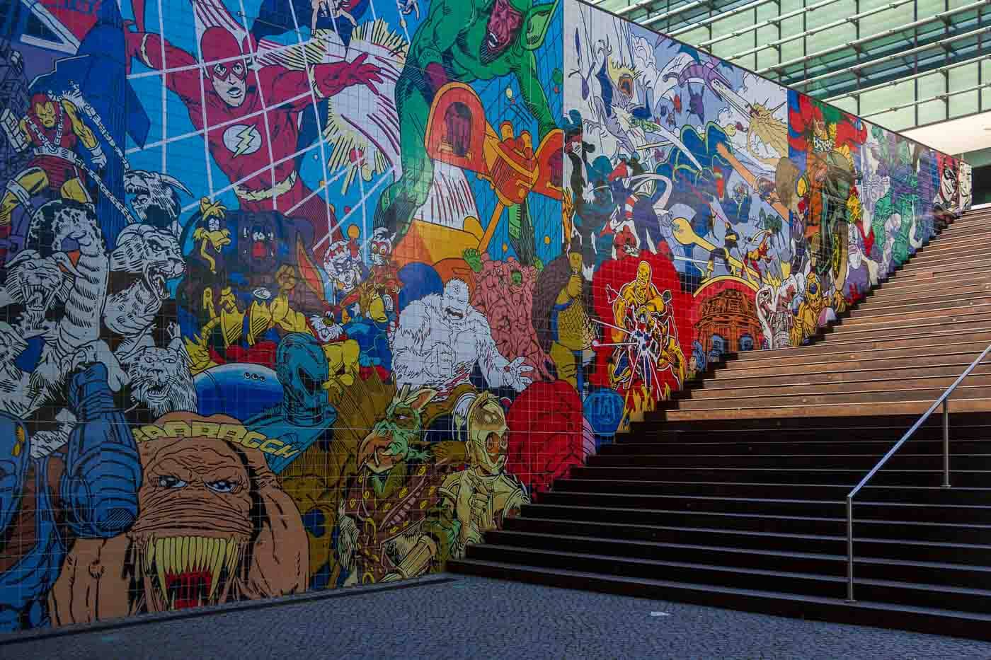 And for a pop-culture explosion, check out Erró's giant mural featuring comic book superheroes! It's a vibrant art piece that adds playful energy to the area. It was interesting to see a bizarre mixture of worlds in the same art piece. It might be the only mural where Superman meets the X-men, and this is not even the most unusual part.