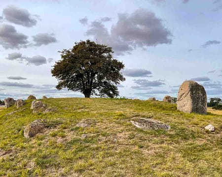 Imagine stepping back over 5,000 years, tracing the footsteps of our ancient ancestors, and exploring the very chambers where they laid their revered dead to rest. On the idyllic Danish island of Møn, you don't just imagine it—you can experience it. Møn is renowned for its remarkably preserved Denmark burial chambers, offering an unparalleled glimpse into the fascinating history of the Funnel Beaker culture.