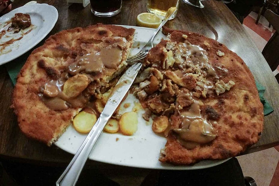 Get ready to conquer Berlin's biggest schnitzel at Louis! This legendary restaurant in historic Rixdorf serves up an epic pork schnitzel that's over a kilo. Discover the taste of tradition and challenge your appetite.