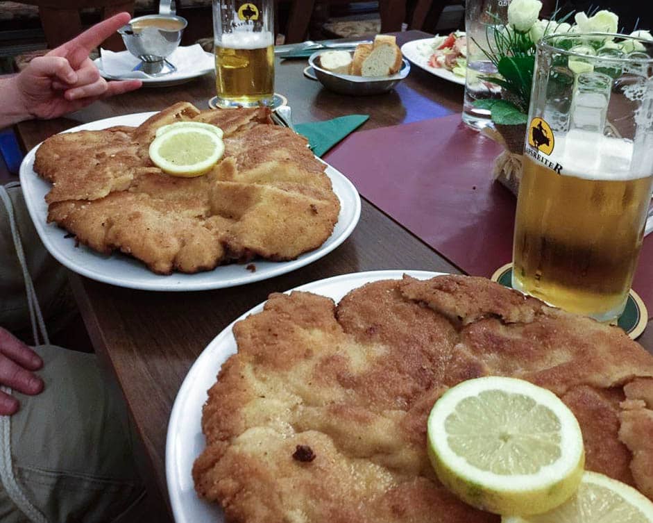 Get ready to conquer Berlin's biggest schnitzel at Louis! This legendary restaurant in historic Rixdorf serves up an epic pork schnitzel that's over a kilo. Discover the taste of tradition and challenge your appetite.