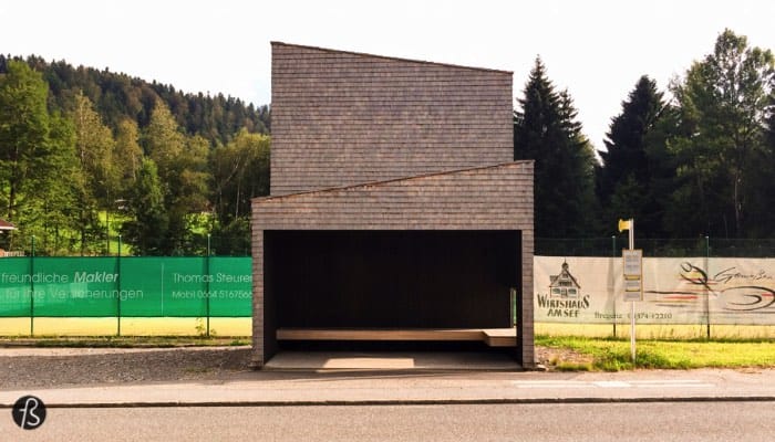 Rintala Eggertsson Architects built something that moves along the boundaries of design, art and architecture. The bus stop they designed responds well to the place where it was built and creates a special narrative for it. The site of this bus stop is close to a tennis court and it was built with a social function in mind. It was augmented to be used as a spectator stand for the tennis court with its timber shingle clad cover.