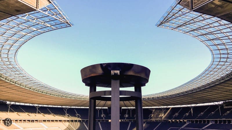A strange feeling came to me during my first visit to the Olympiastadium back in 2012. Those Olympic Rings having between two towers were a sing of the reason why this massive stadium was built: the 1936 Olympics. Those were the profoundly political games that Hitler used to show the world his new Nazi Germany. But those days are over now, and most of the stadium was rebuilt through the years. The track where Jesse Owens once ran is not here anymore but this it the same football field where Zidane head-butted Materazzi during the 2006 World Cup.
