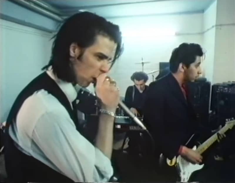 During the years where Nick Cave was living in Berlin, back in the 1980’s, he was filmed for a Dutch documentary called Stranger in a Strange Land. Produced by Bram van Splunteren for the Dutch TV channel VPRO, you get a glimpse of the life of Nick Cave in Berlin even though some parts of the movie are voice-over in dutch. But you don’t need to worry about it, all the interviews with Nick Cave are in English.