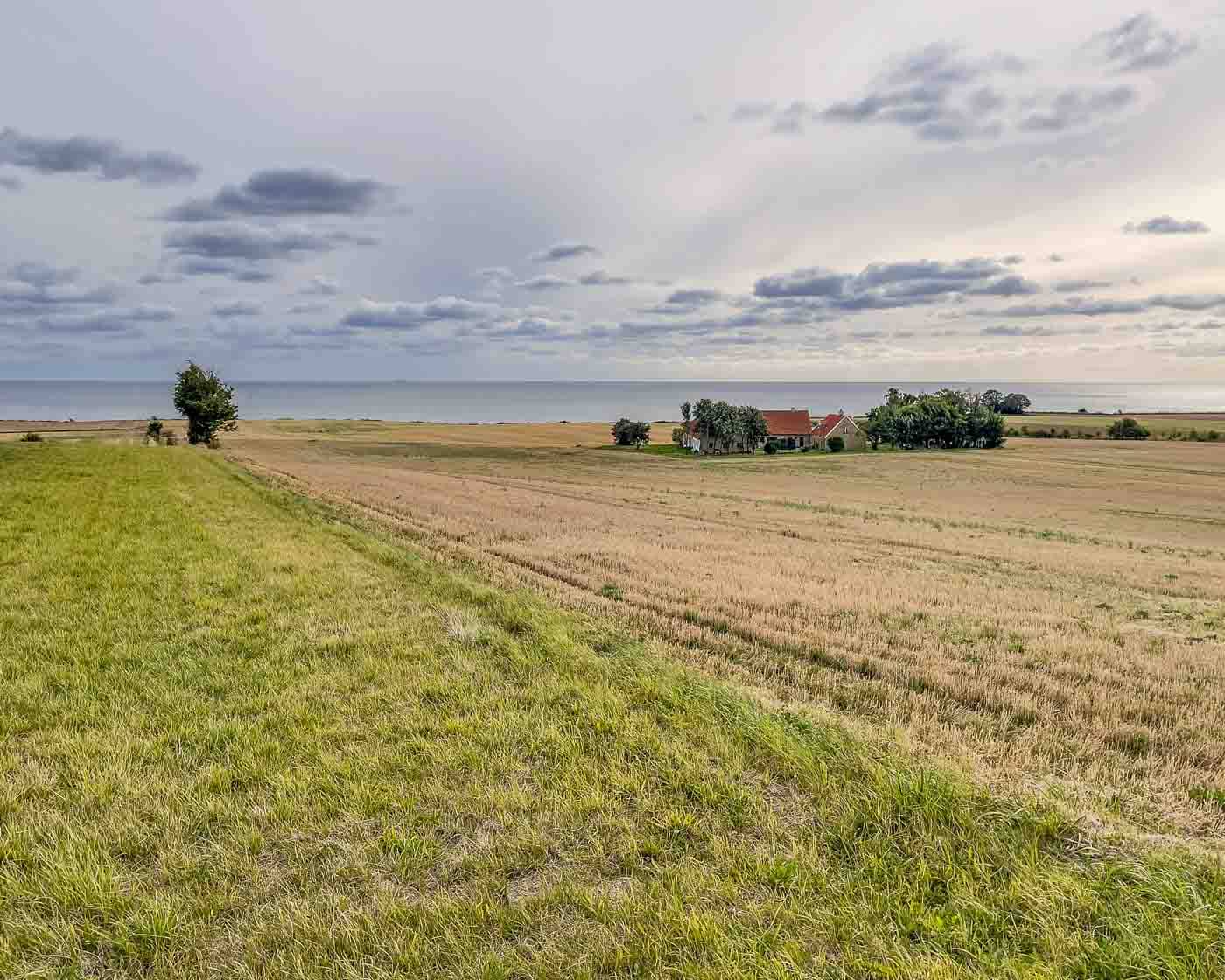 Imagine stepping back over 5,000 years, tracing the footsteps of our ancient ancestors, and exploring the very chambers where they laid their revered dead to rest. On the idyllic Danish island of Møn, you don't just imagine it—you can experience it. Møn is renowned for its remarkably preserved Denmark burial chambers, offering an unparalleled glimpse into the fascinating history of the Funnel Beaker culture.